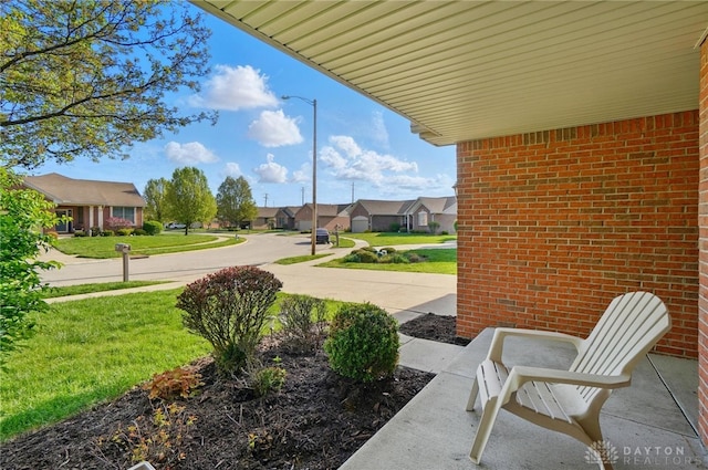 view of patio / terrace with a residential view
