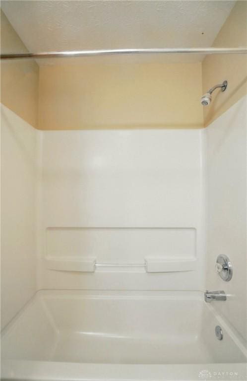 full bath featuring shower / bath combination