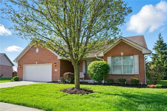 ranch-style house with driveway, a front lawn, an attached garage, and brick siding