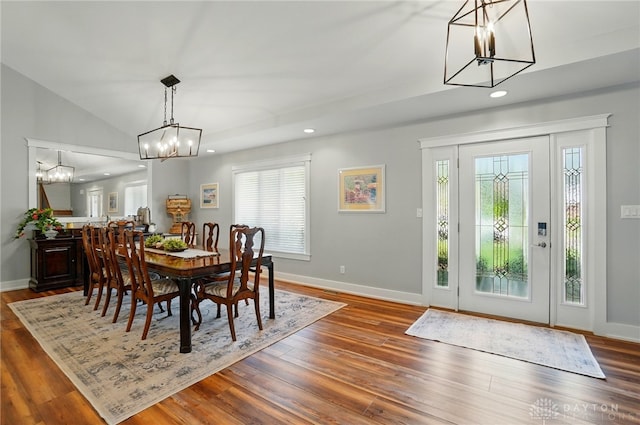 5017 Ackerman Blvd, Kettering, OH 45429 - dining space with a chandelier, plenty of natural light, baseboards, recessed lighting, and lofted ceiling