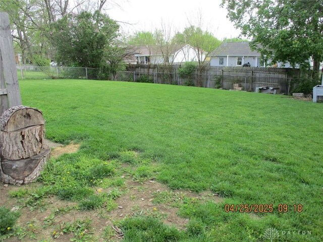 view of yard featuring fence
