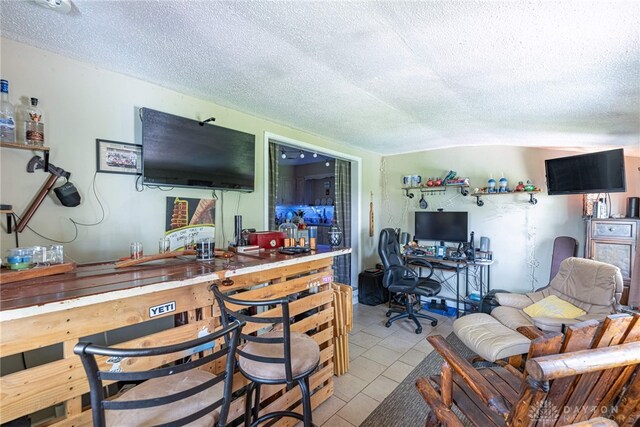 7351 Willow Dr, Blanchester, OH 45107 - living area with a textured ceiling and light tile patterned floors