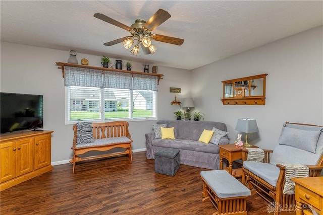 1823 Park Ave, Piqua, OH 45356 - living area with a ceiling fan, wood finished floors, and baseboards