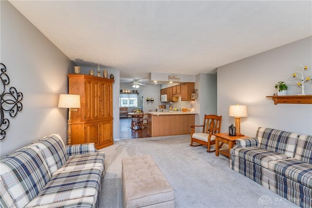 1823 Park Ave, Piqua, OH 45356 - living room featuring light colored carpet and ceiling fan