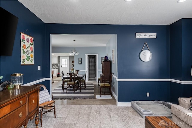 14 Clemens Ave, Jamestown Vlg, OH 45335 - interior space featuring wood finished floors and a chandelier