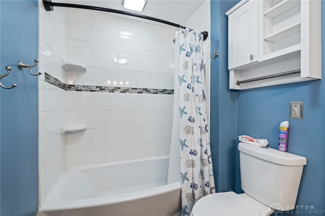 bathroom with toilet and shower / tub combo