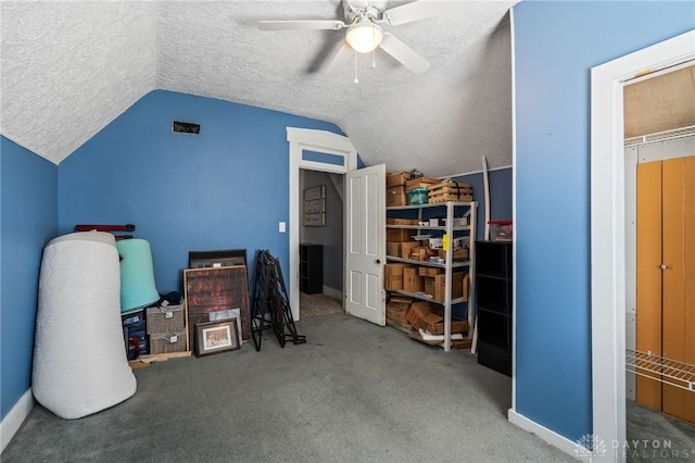 office space featuring lofted ceiling and a textured ceiling