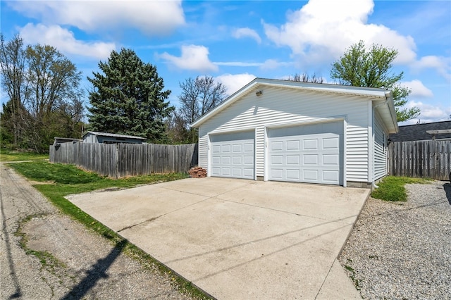 garage featuring fence
