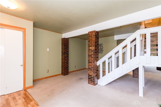 interior space with baseboards, stairway, and carpet flooring