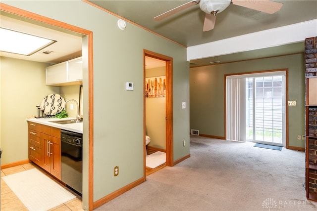 kitchen with visible vents, ceiling fan, dishwasher, and a sink