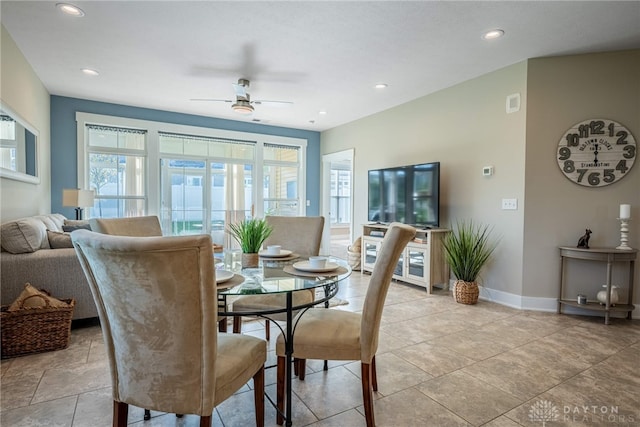 dining area with a ceiling fan, recessed lighting, and baseboards