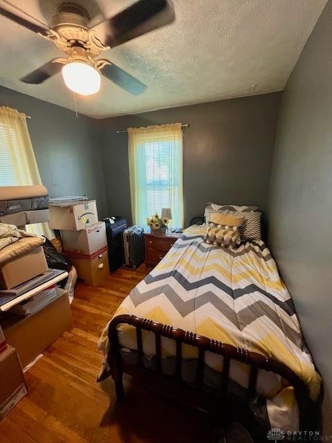 1331 Malden Ave, Springfield, OH 45504 - bedroom with a ceiling fan, wood finished floors, and a textured ceiling