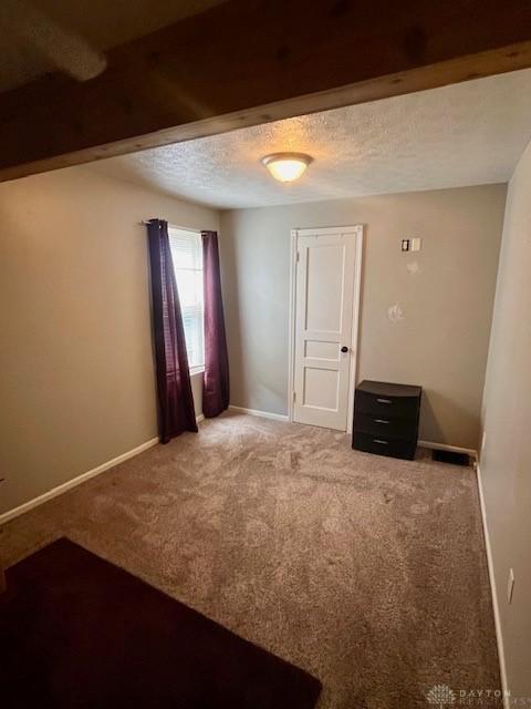 1331 Malden Ave, Springfield, OH 45504 - carpeted spare room with a textured ceiling and baseboards