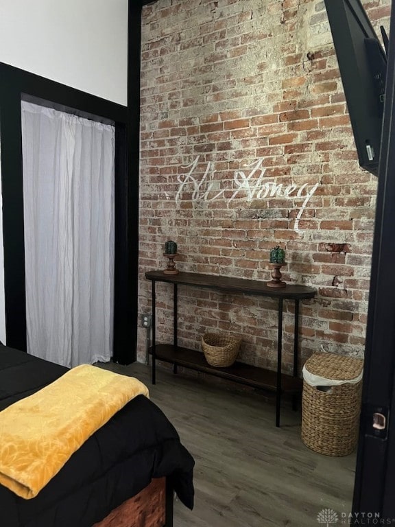 bedroom featuring wood finished floors