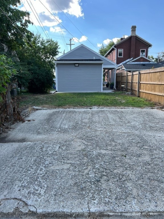 exterior space featuring a yard and fence