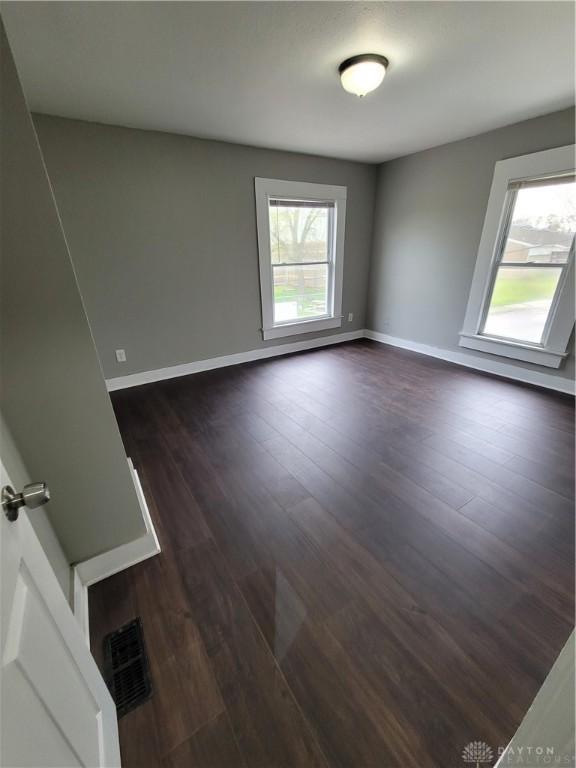 66 Barnett St Unit 64, Dayton, OH 45402 - unfurnished room featuring dark wood-style floors and baseboards