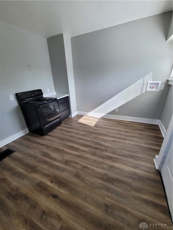 66 Barnett St Unit 64, Dayton, OH 45402 - living room featuring dark wood-style flooring and baseboards