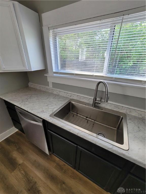 66 Barnett St Unit 64, Dayton, OH 45402 - kitchen featuring a sink, dishwasher, healthy amount of natural light, and dark wood-style flooring