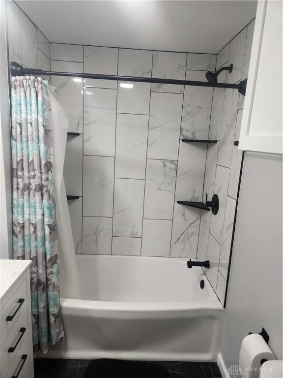 bathroom with vanity and shower / tub combo with curtain