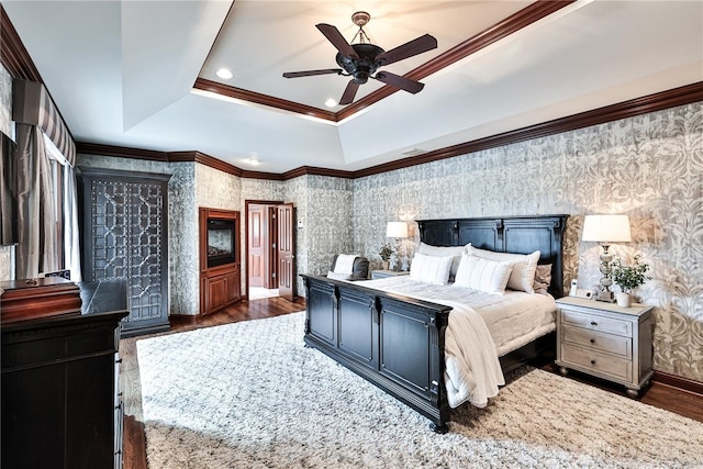 7177 Paul Ln, Liberty Twp, OH 45044 - bedroom featuring wallpapered walls, ornamental molding, dark wood-style flooring, baseboards, and a raised ceiling