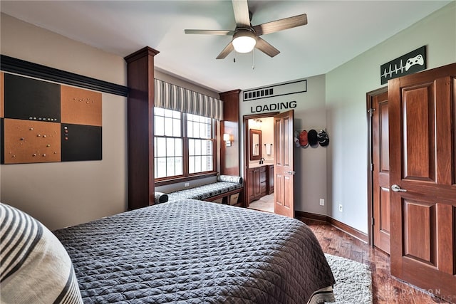 7177 Paul Ln, Liberty Twp, OH 45044 - bedroom with connected bathroom, hardwood / wood-style floors, baseboards, visible vents, and a ceiling fan