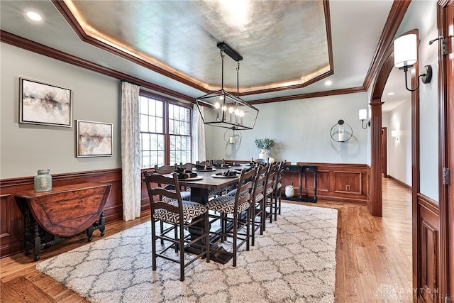 7177 Paul Ln, Liberty Twp, OH 45044 - dining space with a tray ceiling, recessed lighting, light wood finished floors, ornamental molding, and wainscoting