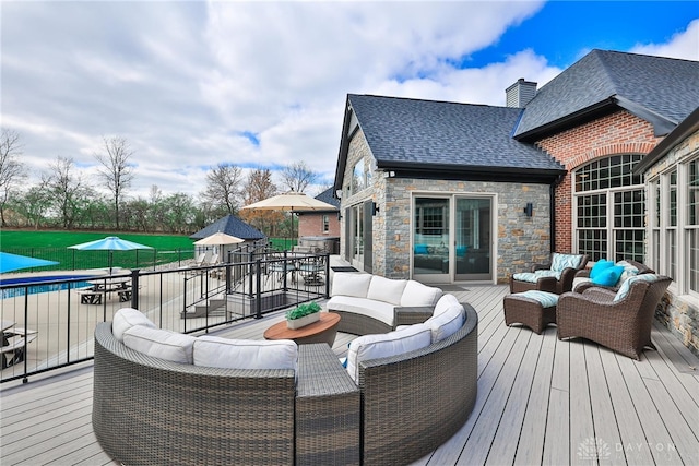 7177 Paul Ln, Liberty Twp, OH 45044 - deck with outdoor lounge area and a fenced in pool