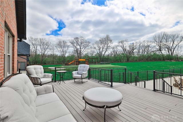 7177 Paul Ln, Liberty Twp, OH 45044 - wooden deck featuring a yard, outdoor lounge area, and a playground