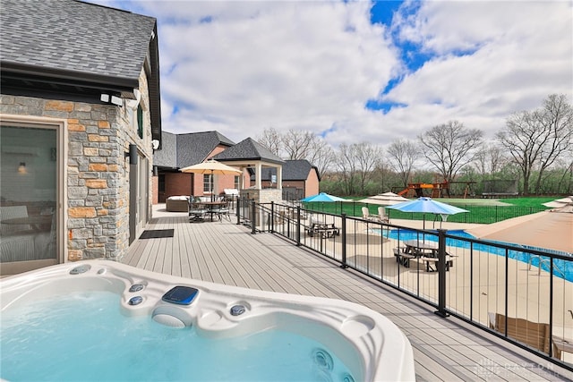 7177 Paul Ln, Liberty Twp, OH 45044 - view of swimming pool featuring a deck, fence, outdoor dining space, and an outdoor hot tub