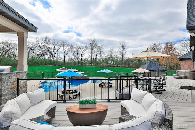 7177 Paul Ln, Liberty Twp, OH 45044 - wooden deck featuring outdoor lounge area, outdoor dining space, a yard, and a fenced in pool