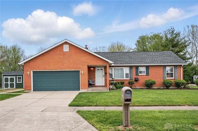 ranch-style house featuring brick siding, a storage unit, a garage, a front lawn, and concrete driveway