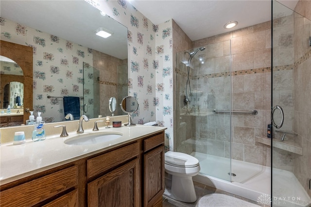 9168 Woodstream Ln, Washington Twp, OH 45458 - bathroom with wallpapered walls, vanity, and a stall shower