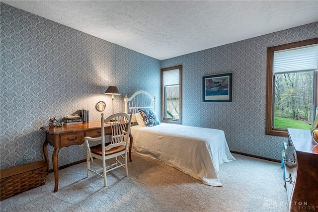 9168 Woodstream Ln, Washington Twp, OH 45458 - bedroom featuring a textured ceiling, carpet floors, and wallpapered walls
