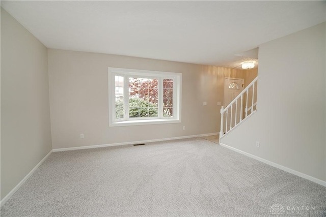 8500 Crestmont Dr, West Chester, OH 45069 - empty room with carpet floors and stairs