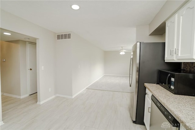 8500 Crestmont Dr, West Chester, OH 45069 - kitchen featuring dishwasher, black microwave, white cabinetry, ceiling fan, and recessed lighting