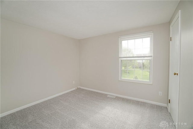 8500 Crestmont Dr, West Chester, OH 45069 - spare room featuring light carpet and baseboards
