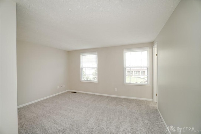 8500 Crestmont Dr, West Chester, OH 45069 - spare room featuring carpet floors and a textured ceiling