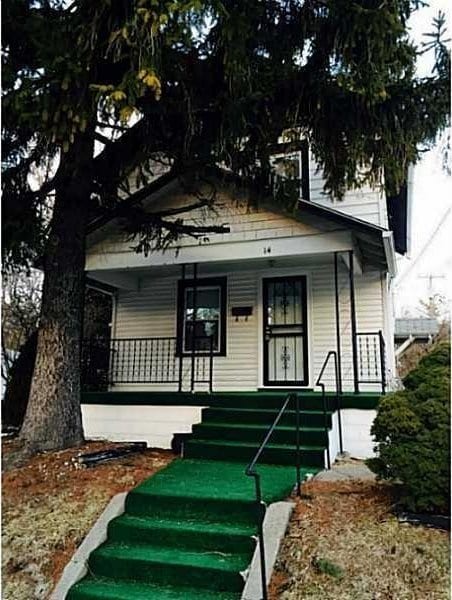 14 N Freeman St, Springfield, OH 45503 - view of front facade with a porch