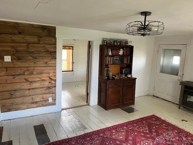 3668 Concord Fairhaven Rd, Eaton, OH 45320 - dining space with light wood-type flooring, a chandelier, and baseboards