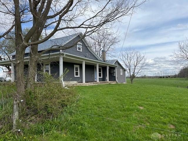 3668 Concord Fairhaven Rd, Eaton, OH 45320 - view of front of home featuring a front yard and covered porch