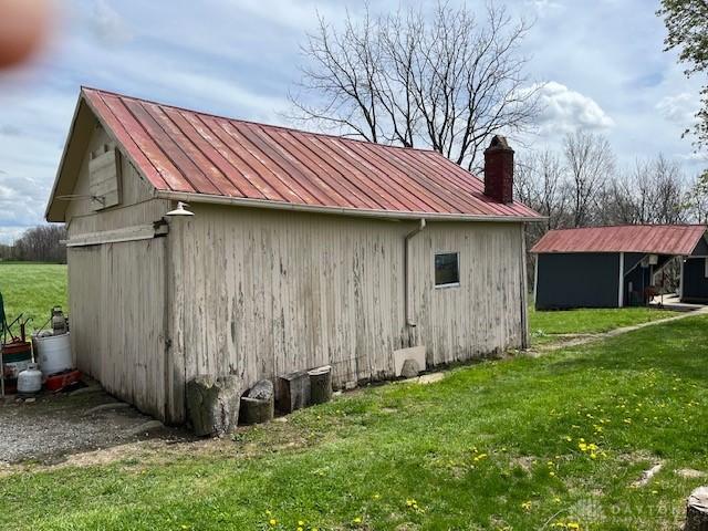 3668 Concord Fairhaven Rd, Eaton, OH 45320 - view of pole building with a yard