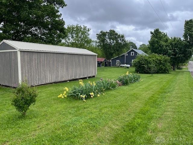 3668 Concord Fairhaven Rd, Eaton, OH 45320 - view of grassy yard featuring an outbuilding and a pole building