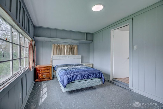 bedroom with a decorative wall