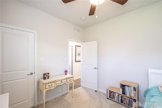 carpeted bedroom featuring visible vents, ceiling fan, and baseboards