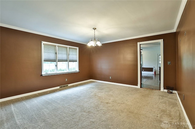 10699 Hamilton Ave, Cincinnati, OH 45231 - carpeted empty room featuring a chandelier, crown molding, and baseboards