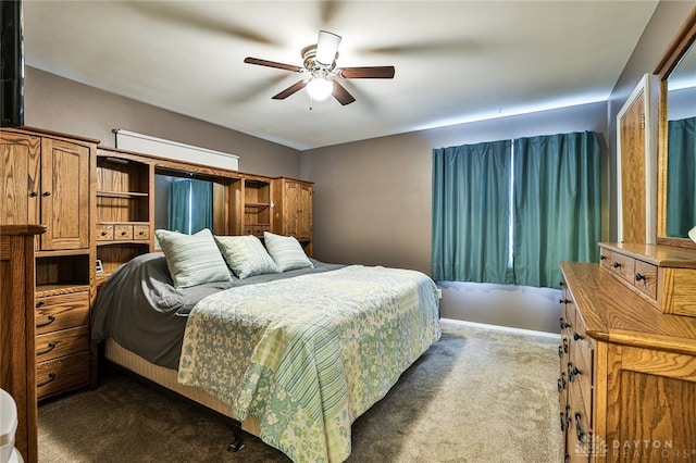 10699 Hamilton Ave, Cincinnati, OH 45231 - bedroom with dark carpet and a ceiling fan