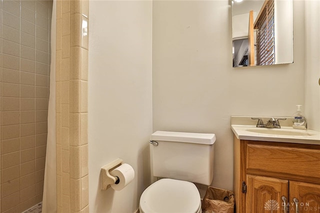10699 Hamilton Ave, Cincinnati, OH 45231 - bathroom with vanity, toilet, and a tile shower