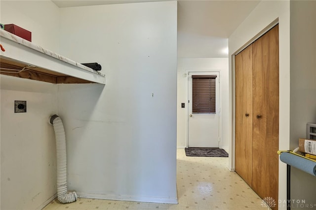 10699 Hamilton Ave, Cincinnati, OH 45231 - laundry room with hookup for an electric dryer, light flooring, and baseboards