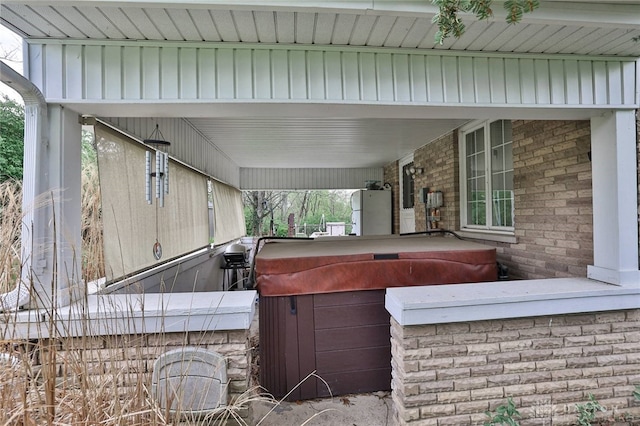 10699 Hamilton Ave, Cincinnati, OH 45231 - view of patio / terrace with a hot tub