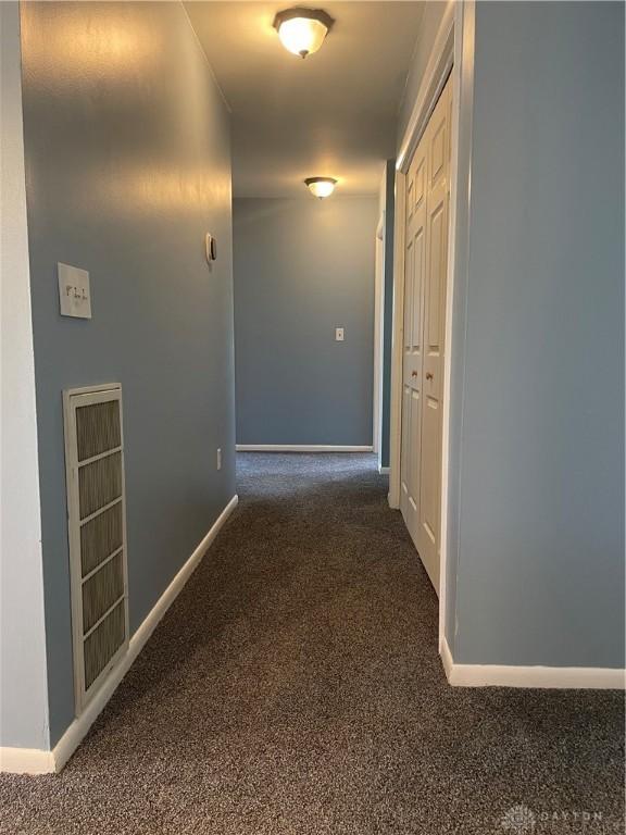 928 Shady Ln, Beavercreek, OH 45434 - hallway with carpet floors and baseboards